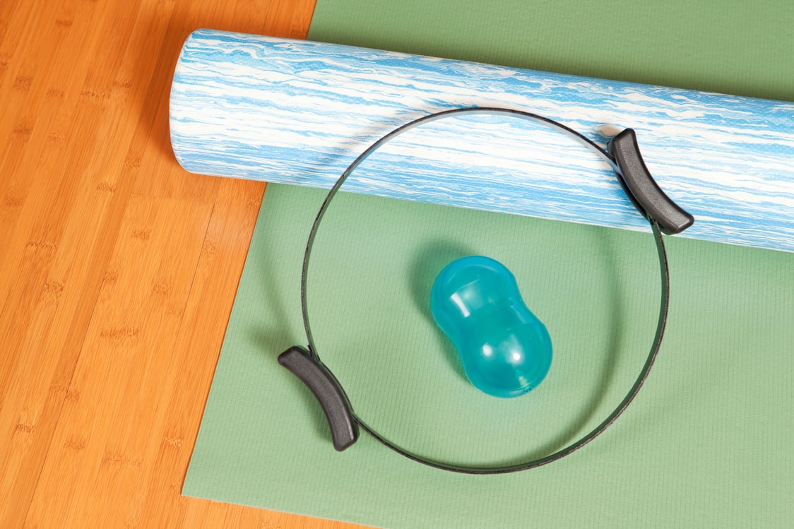 Pilates Roller, Ring, Ball on Mat and Studio Floor